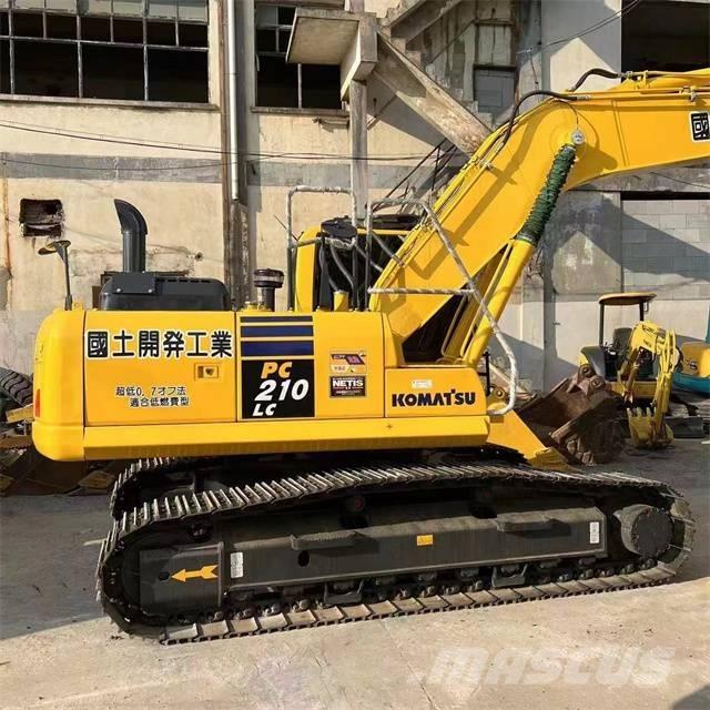 Komatsu PC 210 Beltegraver