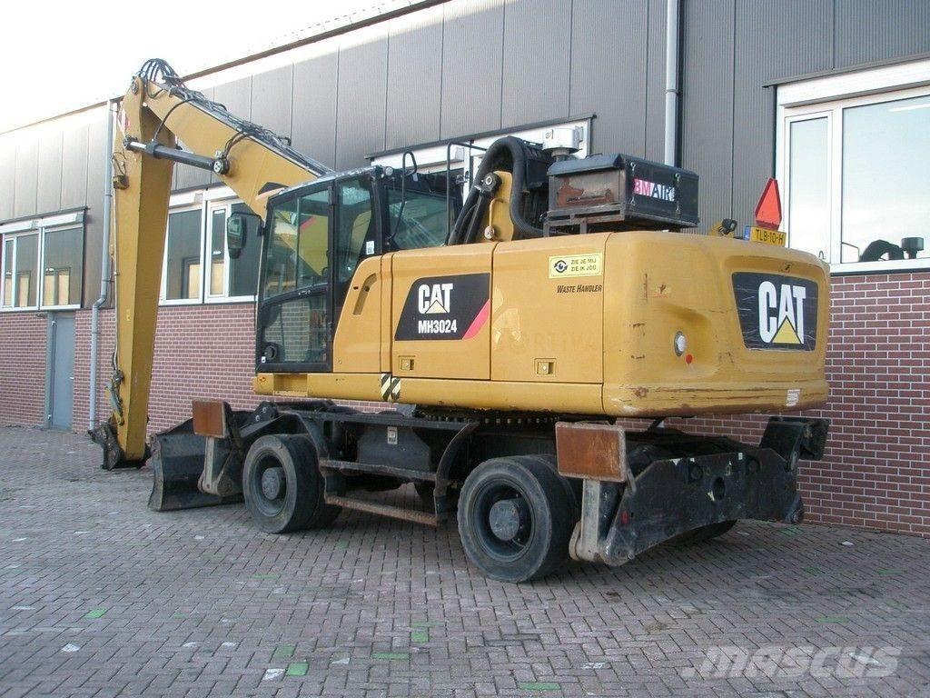 CAT MH3024 Gravemaskiner for avfallshåndtering