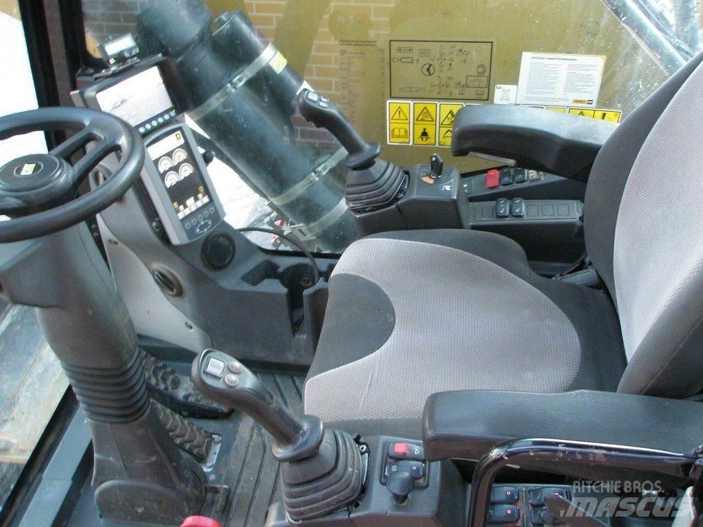 CAT MH3024 Gravemaskiner for avfallshåndtering