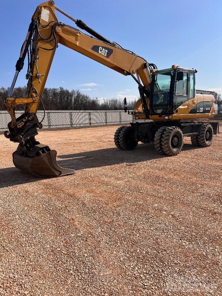 CAT 316D Hjulgravere
