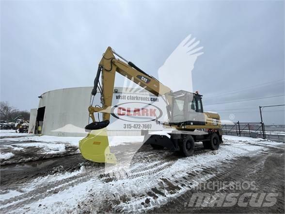 CAT M318D Hjulgravere