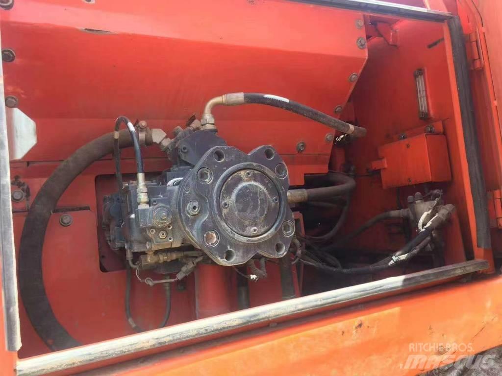 Hitachi ZX 210 Beltegraver