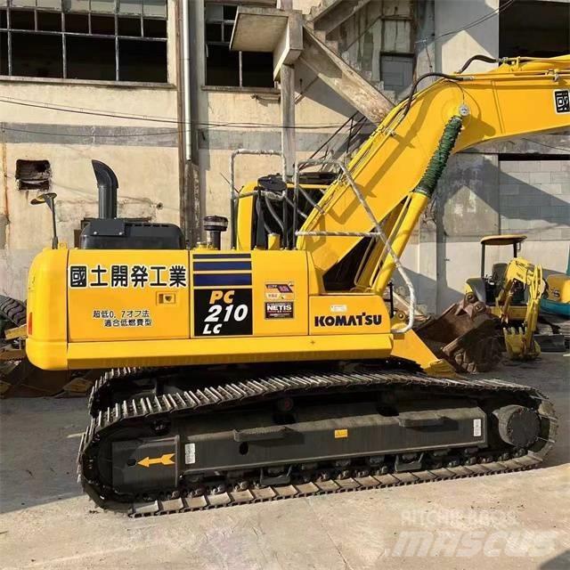 Komatsu PC 210-8 Beltegraver