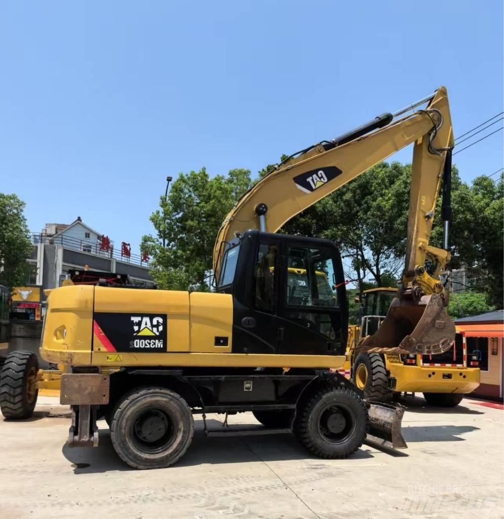 CAT M 320 Hjulgravere