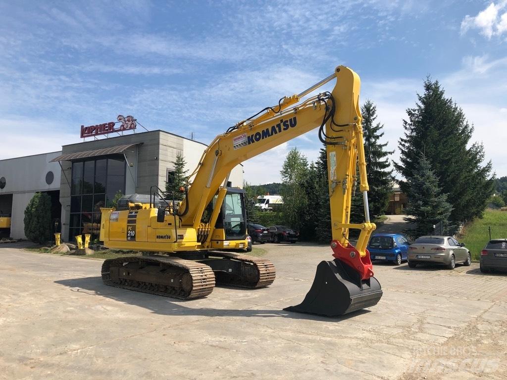 Komatsu PC210LC-11 Beltegraver