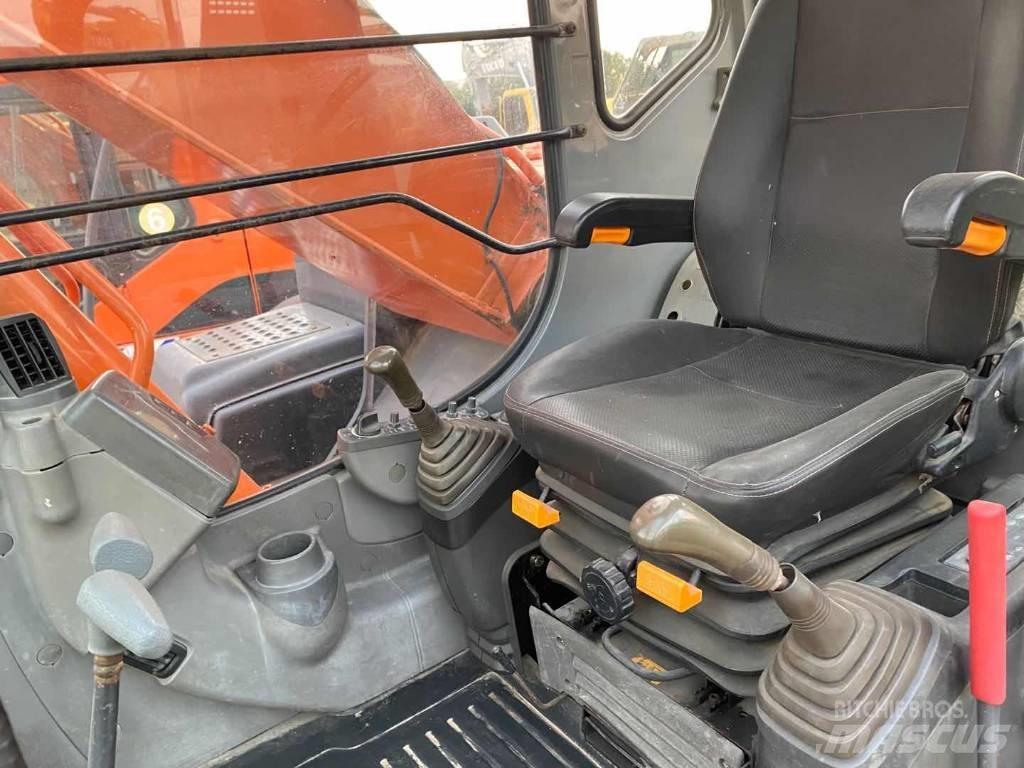 Hitachi ZX 210 Beltegraver