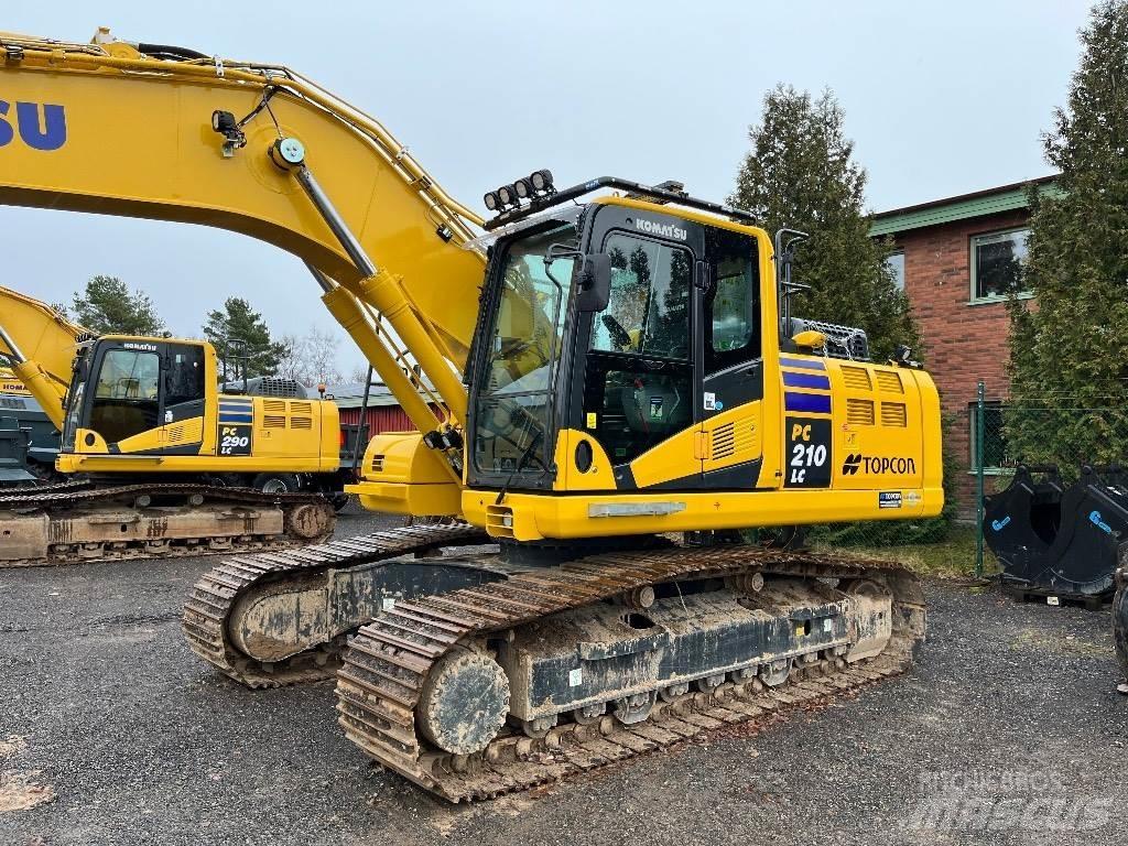 Komatsu PC210LC-11 Beltegraver