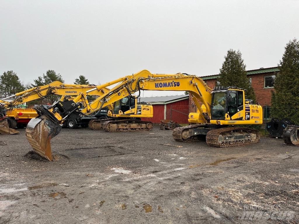 Komatsu PC210LC-11 Beltegraver