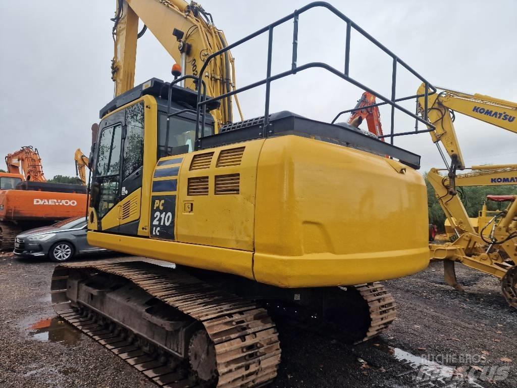 Komatsu PC210LC-11 Beltegraver