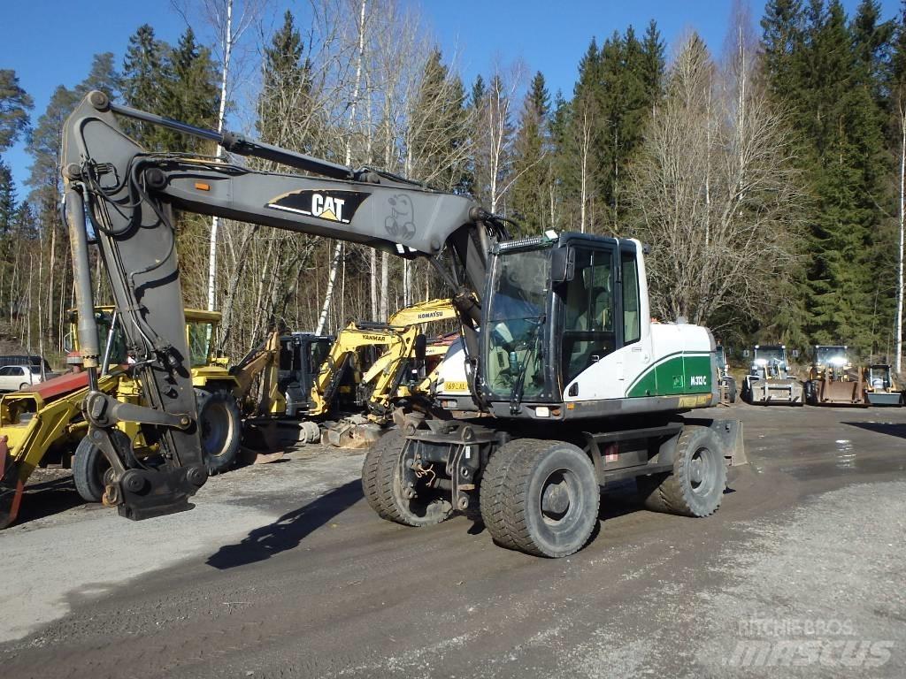 CAT M 313 C 4x4 Hjulgravere