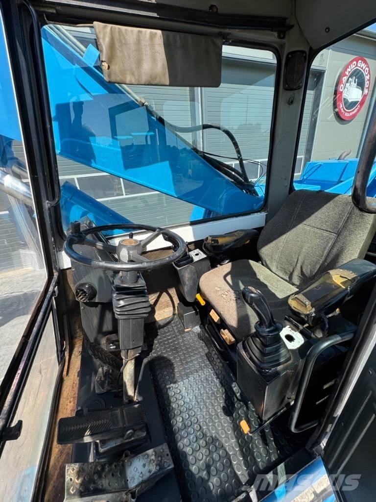 Fuchs MHL 331 Gravemaskiner for avfallshåndtering