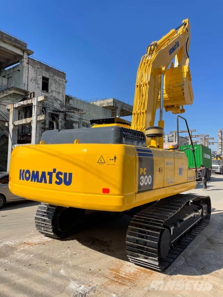 Komatsu PC300-7 Beltegraver