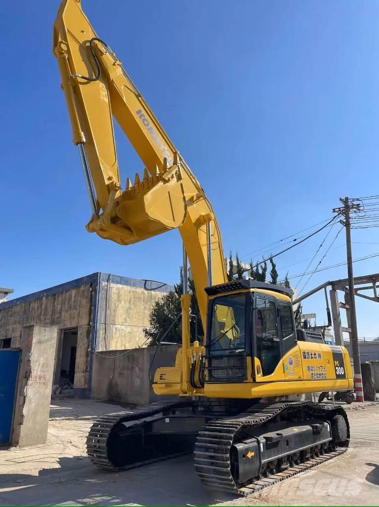 Komatsu PC300-7 Beltegraver