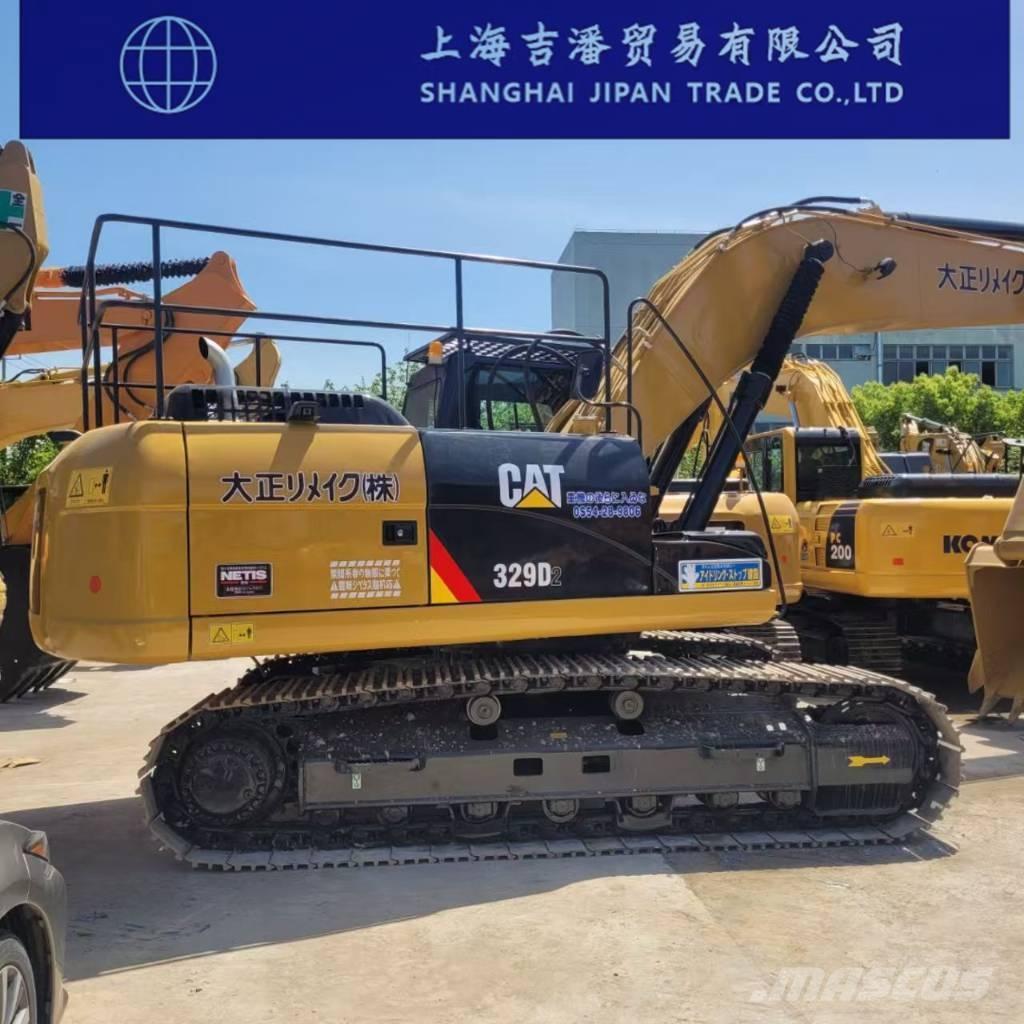 CAT 329 Beltegraver