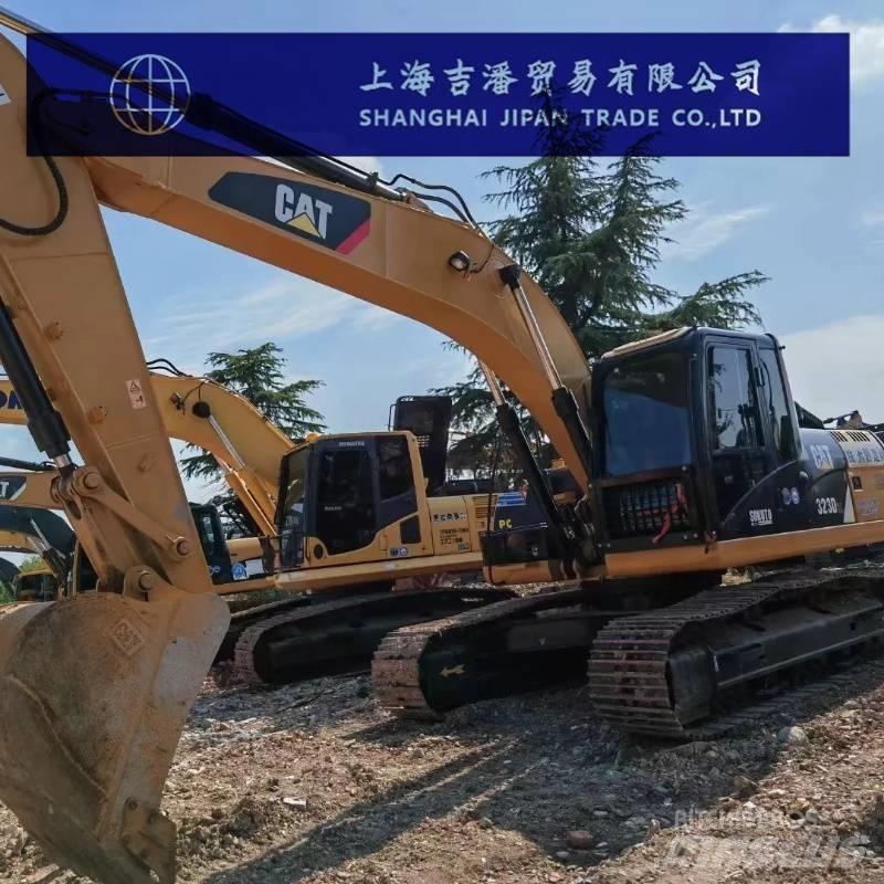 CAT 323 D Beltegraver