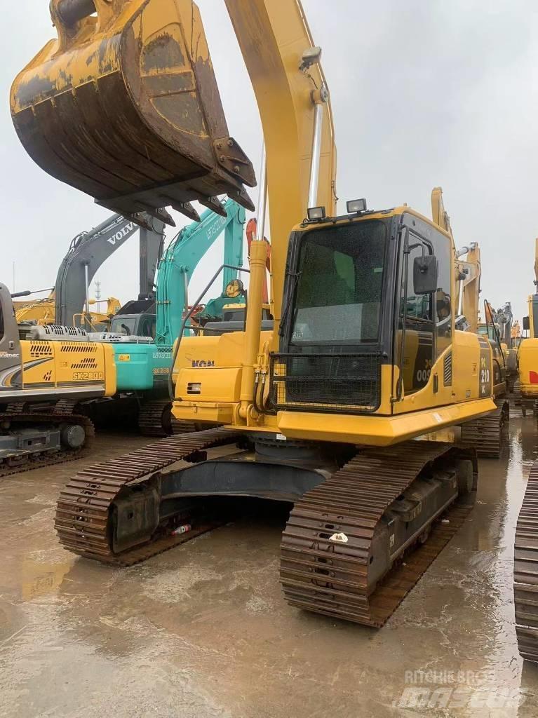 Komatsu PC 210-8 Beltegraver