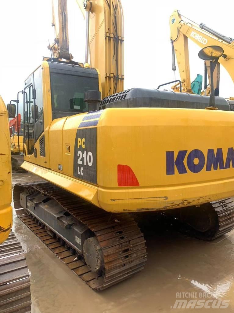 Komatsu PC 210-8 Beltegraver