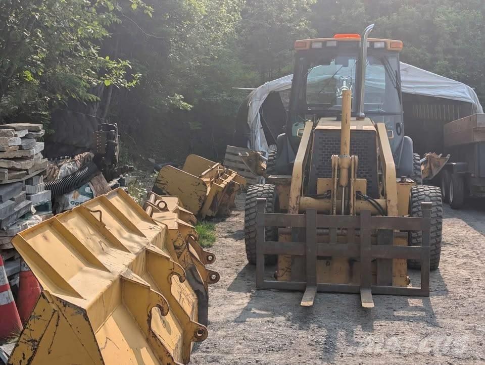 John Deere 310 SE Traktorgravere