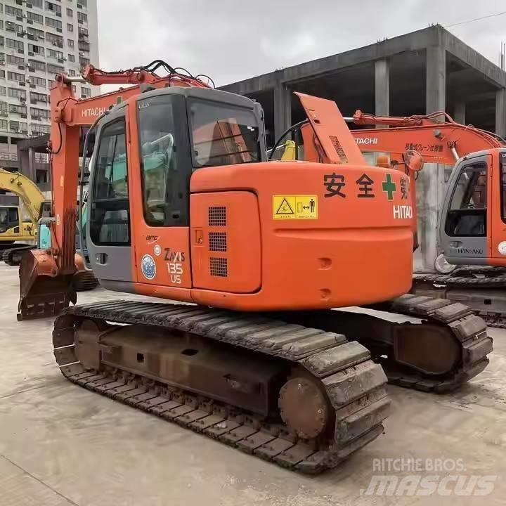 Hitachi ZX135US Beltegraver