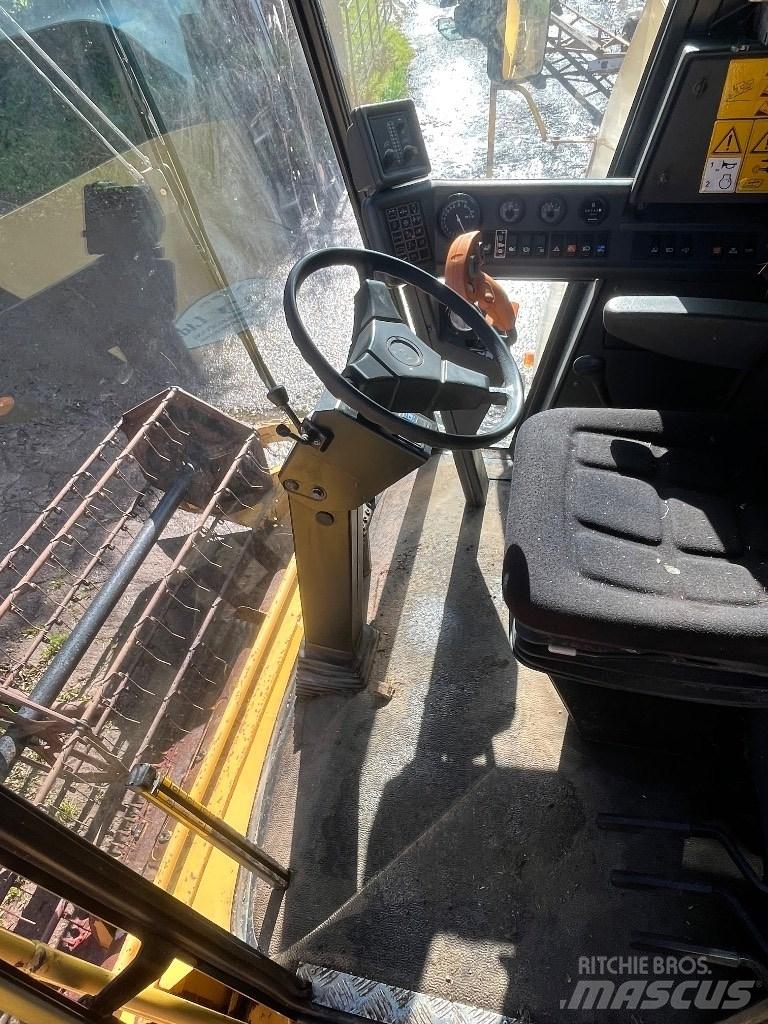 New Holland TC 56 H Skurtreskere