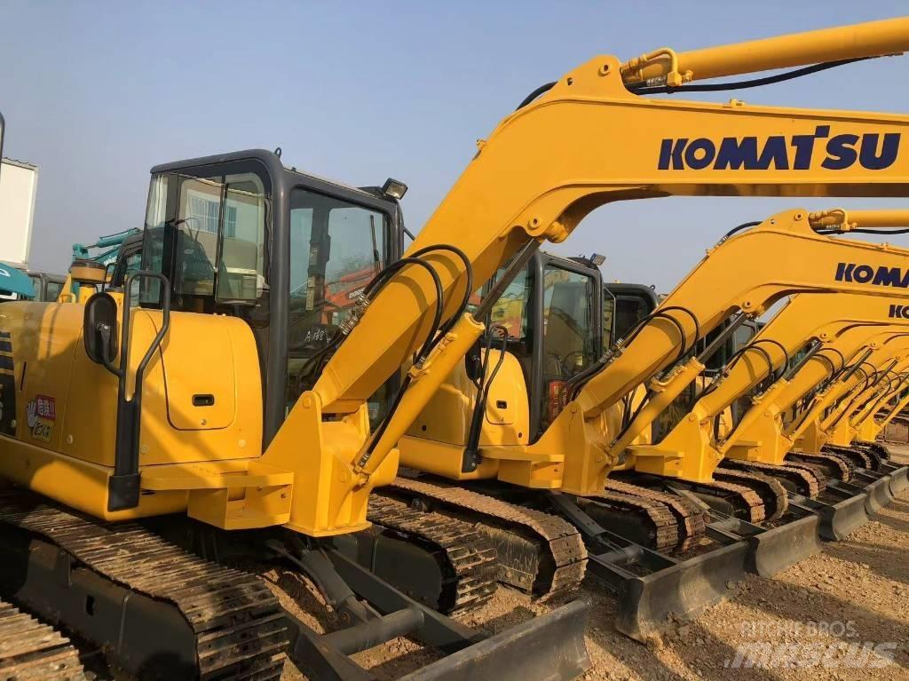 Komatsu 56-7 Beltegraver