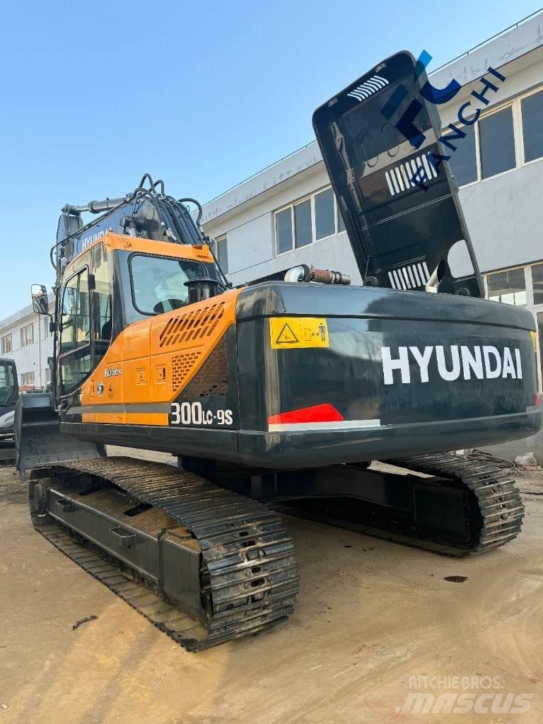 Hyundai 300LC-9S Beltegraver