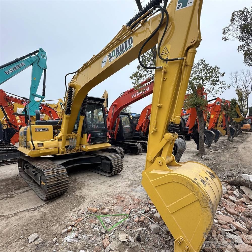 Komatsu PC 130-7 Beltegraver