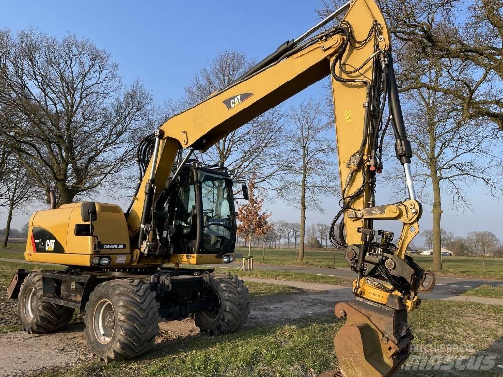 CAT M 313 D Hjulgravere