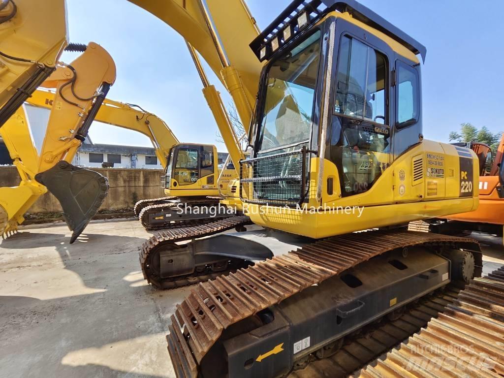 Komatsu PC220-7 Beltegraver