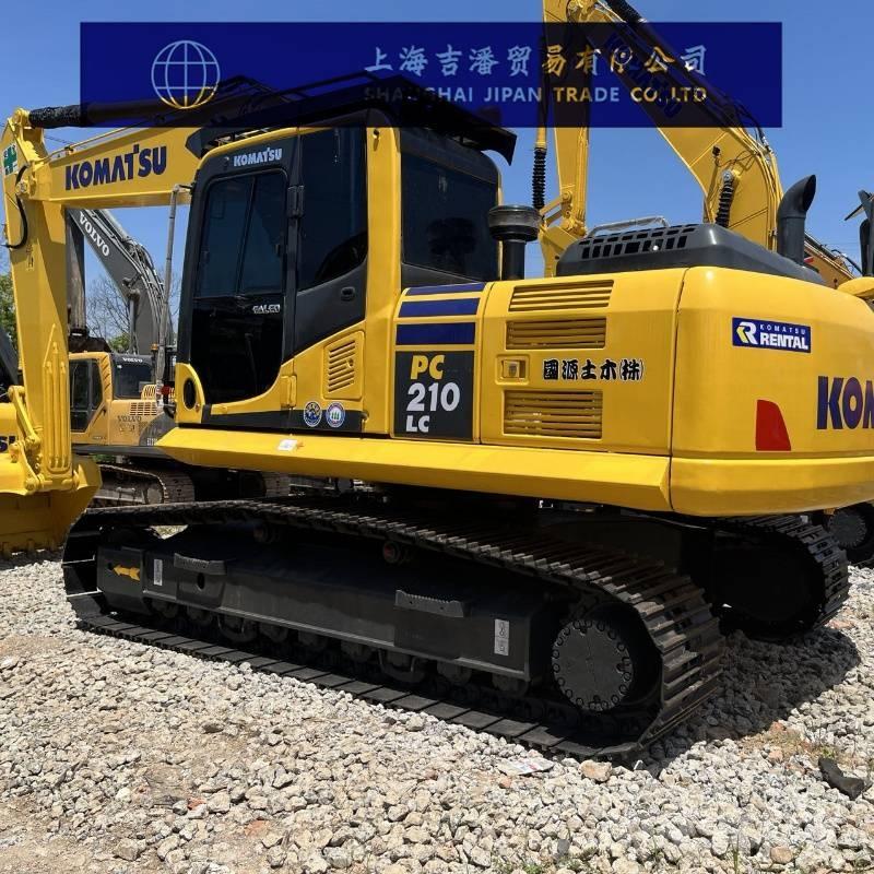 Komatsu PC 210 Beltegraver