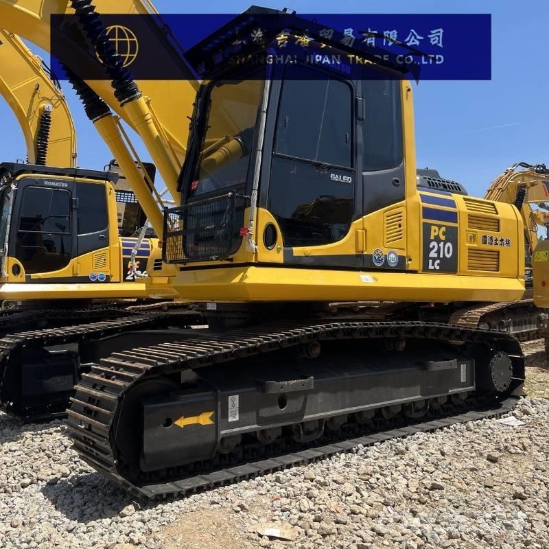 Komatsu PC 210 Beltegraver