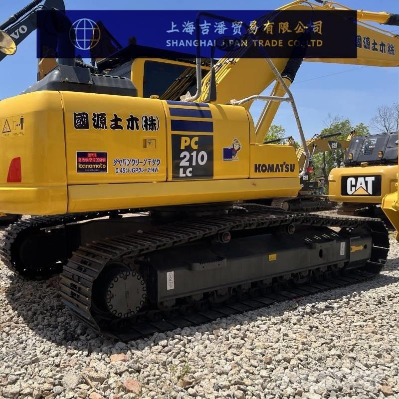 Komatsu PC 210 Beltegraver