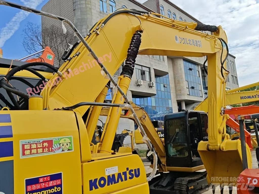 Komatsu PC 220-7 Beltegraver