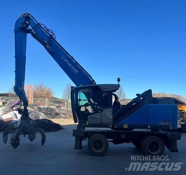 Fuchs MHL 331 Gravemaskiner for avfallshåndtering