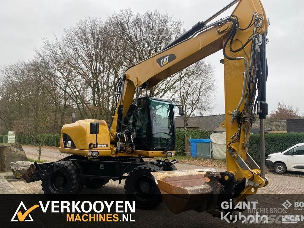 CAT M313D Hjulgravere