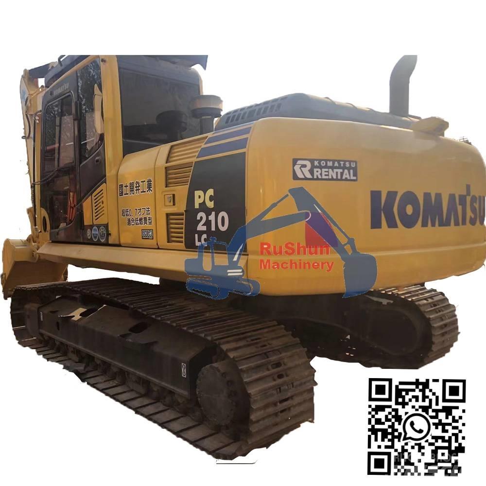 Komatsu PC210LC-8 Beltegraver