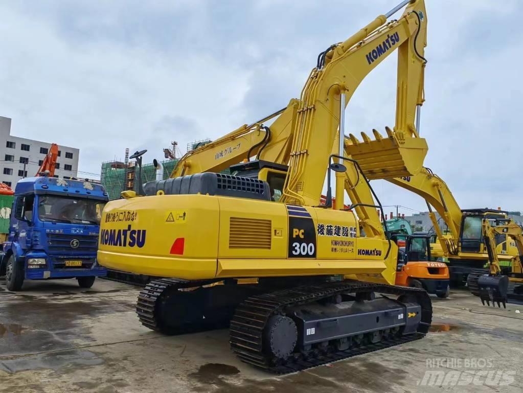 Komatsu PC 300-8 Beltegraver