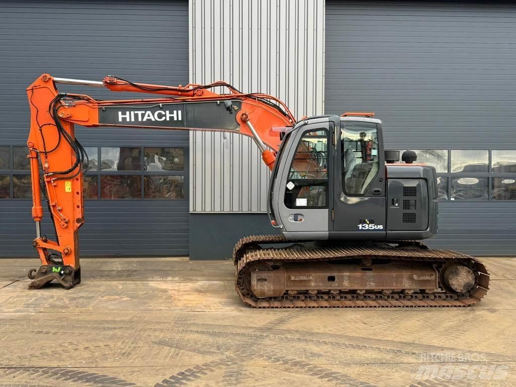 Hitachi ZX135US Beltegraver