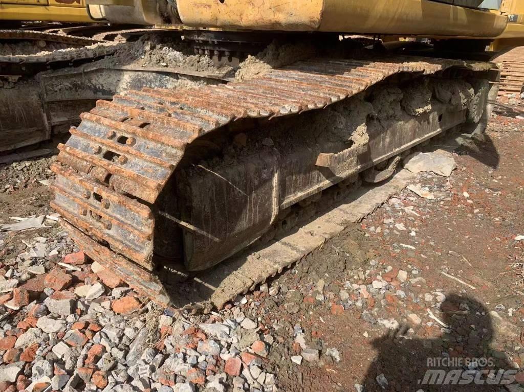 CAT 323D2 Beltegraver