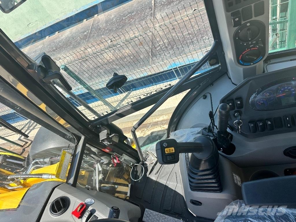 New Holland B 115 B Traktorgravere
