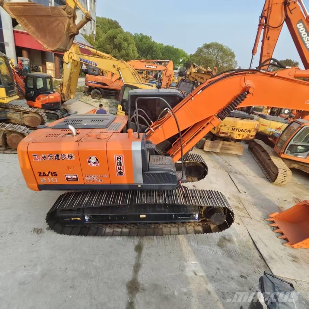Hitachi ZX 210 Beltegraver