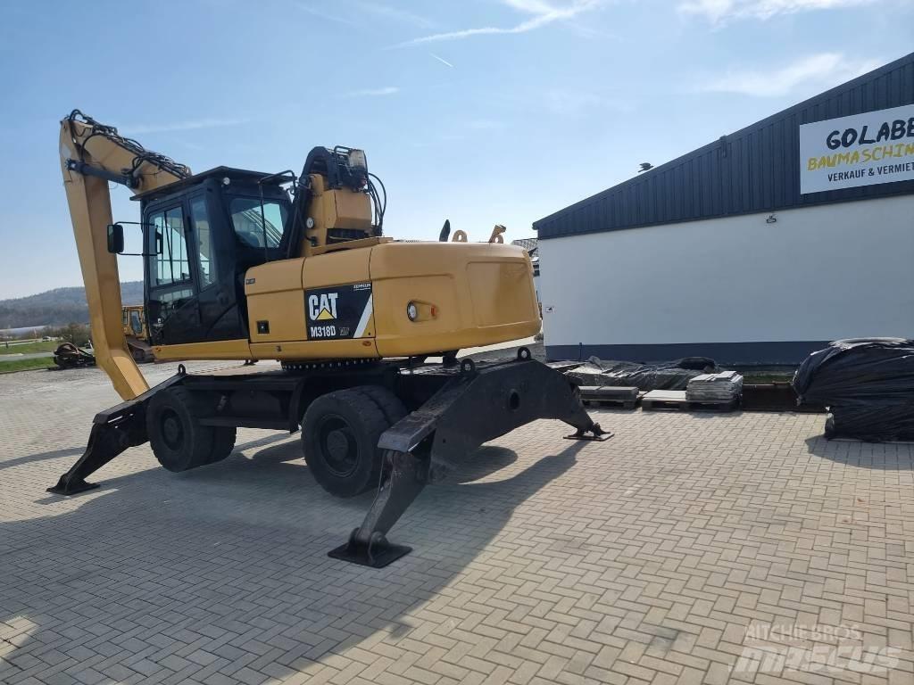 CAT 318D Gravemaskiner for avfallshåndtering