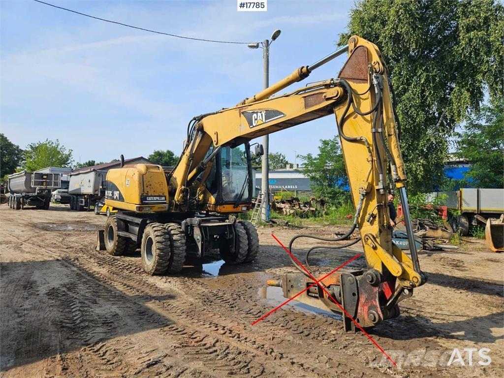 CAT M313 C Hjulgravere