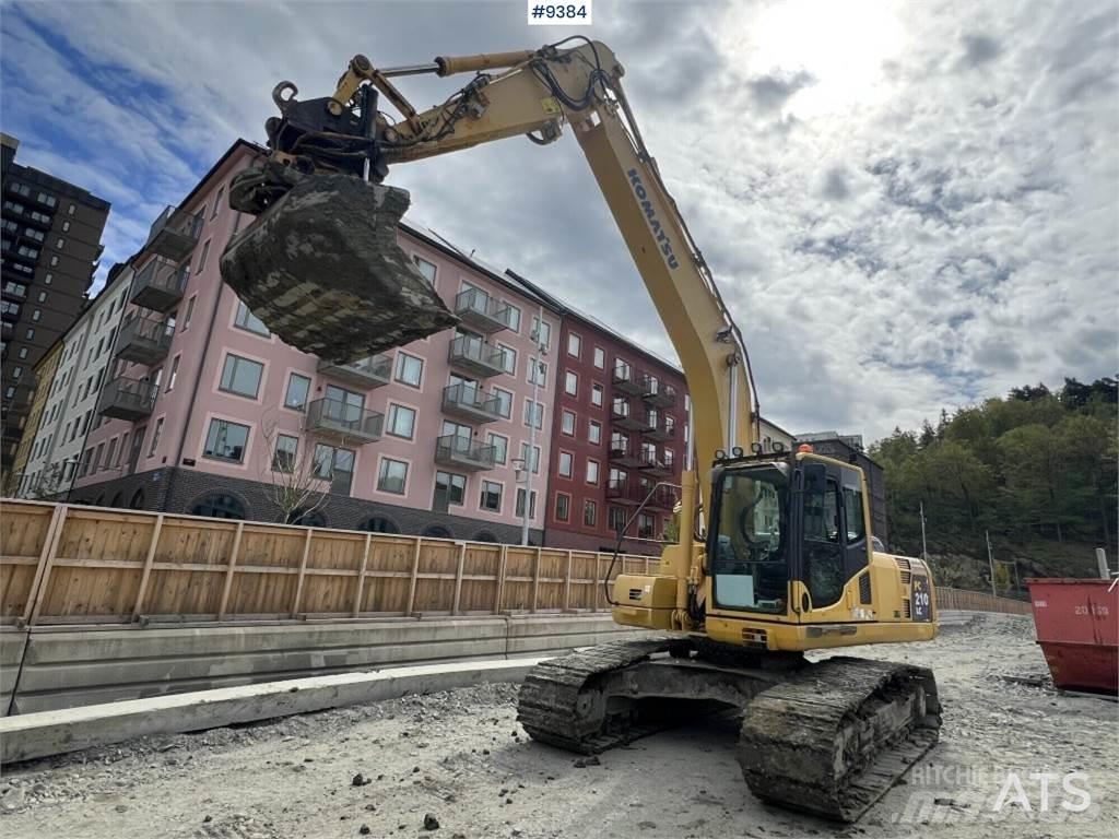 Komatsu PC210LC-8 Beltegraver