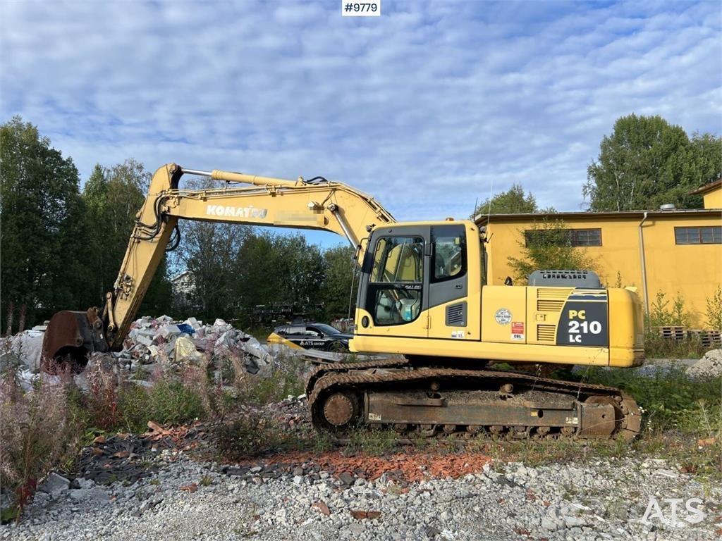 Komatsu PC210LC-8 Beltegraver
