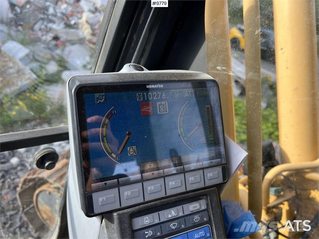 Komatsu PC210LC-8 Beltegraver