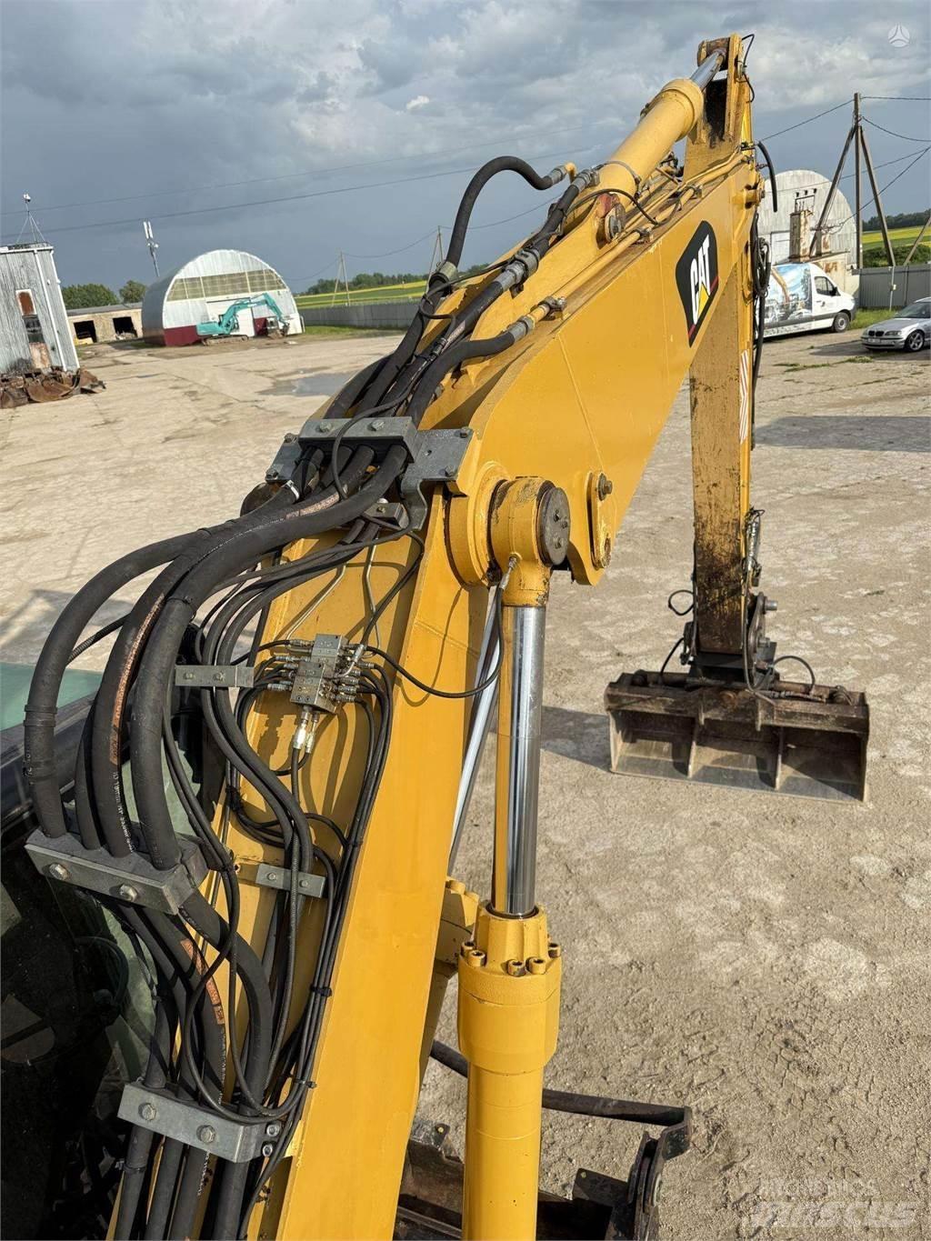 CAT M315C Hjulgravere