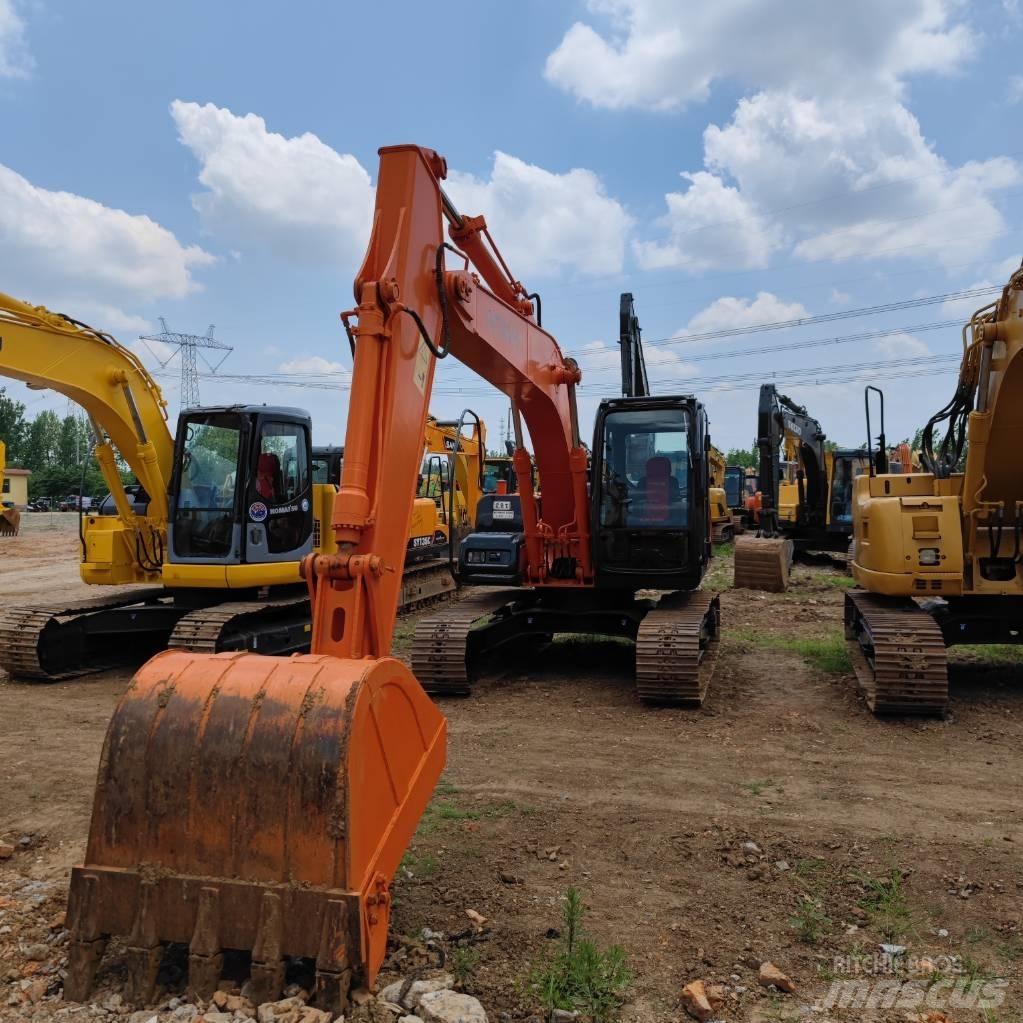 Hitachi ZX 120 Beltegraver