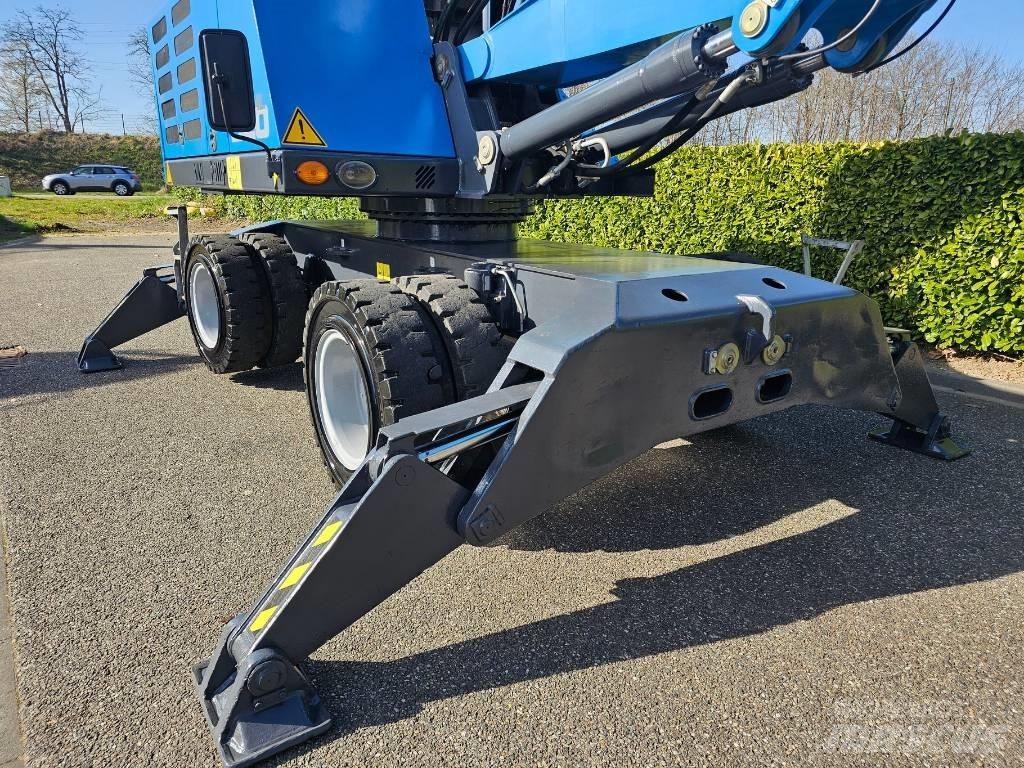 Fuchs MHL 320 Gravemaskiner for avfallshåndtering