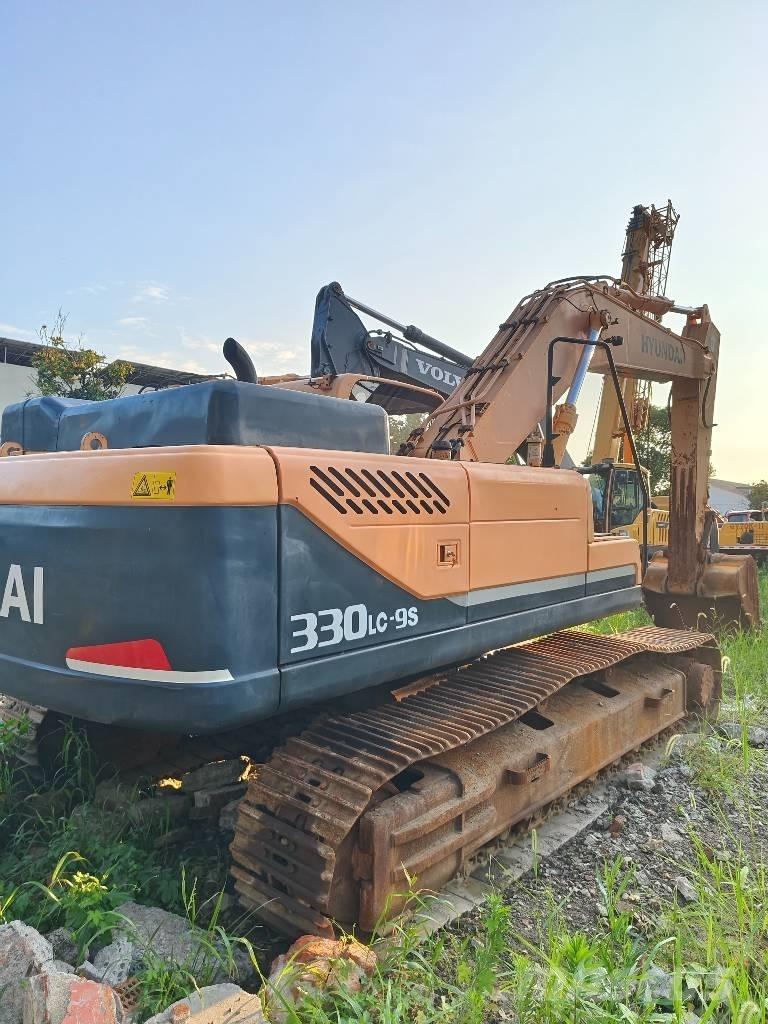 Hyundai R330LC-9S Beltegraver